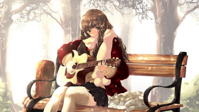 Девушка аниме с гитарой.