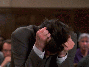 2. Гифка с Джимом Керри рвущим волосы на голове из фильма «Лжец, лжец»